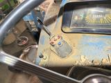 a close up of a steering wheel and dashboard of a vehicle