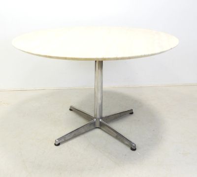 an image of a white table with a metal base