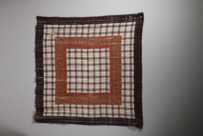 an image of a piece of cloth hanging on a wall