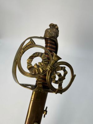 an image of a close up of a metal object with a clock on it