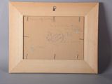 an old picture frame with a drawing of a bird on it