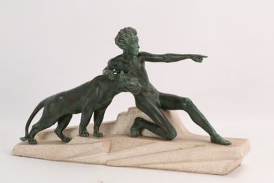 statue of a boy and a dog on a stone base