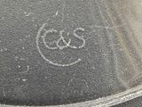 a close up of a glass plate with a logo on it