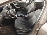 a picture of the interior of a car with black leather seats