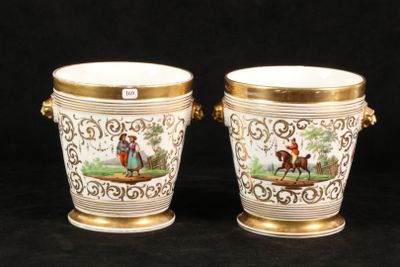 pair of antique porcelain vases with gold trimmings on them