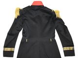 a black jacket with gold trims and a red collar