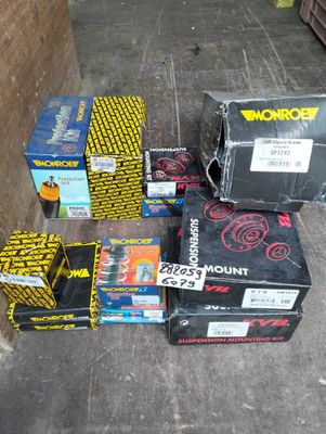 many boxes that are stacked up on the ground
