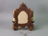 a small wooden picture frame with a picture on it