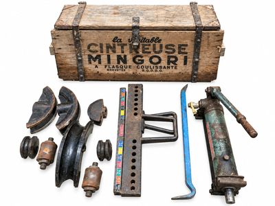 a wooden box with various tools and tools in it