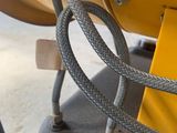 a close up of a cable connected to a machine
