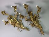 pair of antique brass wall sconces with flowers and leaves