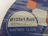 a picture of a disc with a sticker on it