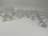 a lot of empty wine glasses on the table