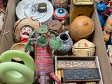 a box full of assorted items sitting on a table