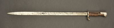an image of a knife that is laying on a table