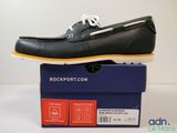 a pair of shoes that are on top of a box