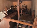a small room with a desk and a chair in it