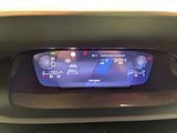 an image of a car dashboard with a digital display