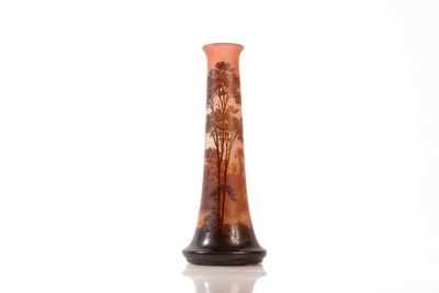a vase that is sitting on a table with a white background