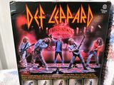 an image of a box with a picture of a band on it