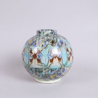 a small vase with a blue and brown design on it
