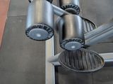 a bench with a bunch of dumbs on it in a gym
