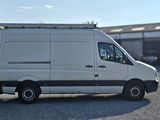 a white van that is parked in a parking lot