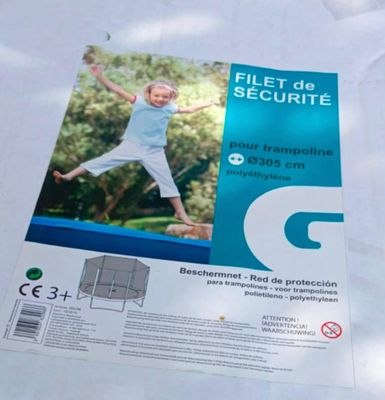 a picture of a picture of a child jumping on a trampol