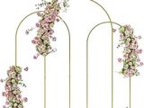 an image of a wedding arch decorated with pink flowers and greenery