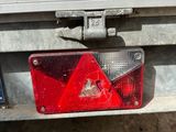 a close up of a red light on the back of a truck