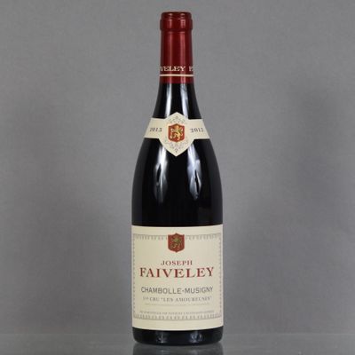 a bottle of wine that is sitting on a table