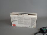 a box that has a charger on top of it