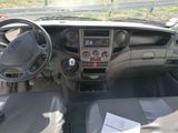 a picture of a car dashboard with a steering wheel