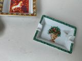 a small box with a picture of a horse and a vase on it