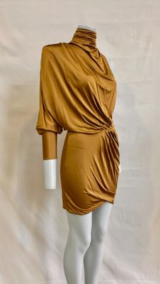 a mannequin wearing a brown dress on a mannequin mannequin mannequin mannequin mannequin mannequin mannequin mann