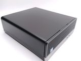 an image of a black desktop computer sitting on top of a white surface