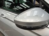 a close up of a car ' s side mirror on the side of the car
