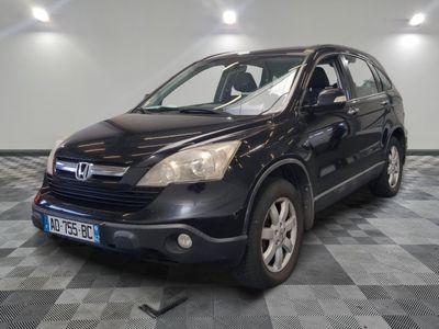 a picture of a black honda cr - v on a checkered floor