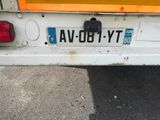 a close up of a license plate on a truck