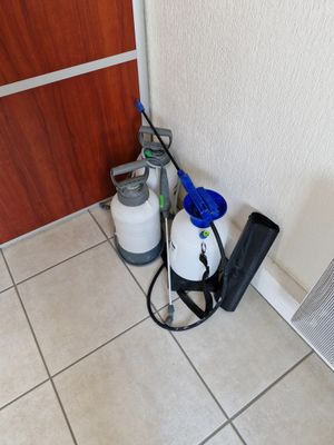 a picture of a room with a heater and a fan