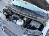a car that has its hood open with the hood open
