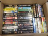a lot of dvds in a box on the table