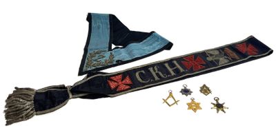 two scarfs with a star and cross on them are laying next to each other