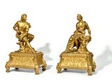 pair of antique bronze figurines of a man and a woman