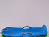a blue and green tray with a handle on top of it