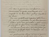 lettre manuscrite écrite à l'encre noire sur une feuille de papier