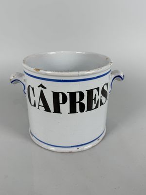 an image of a white and blue cup with the word capresss on it