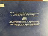 a blue book with a picture of a globe on it