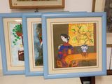 three framed pictures of a woman sitting on a couch