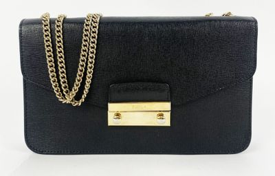 a black purse with a gold chain on it